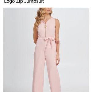 DKNY logo jumpsuit new with tags size 10